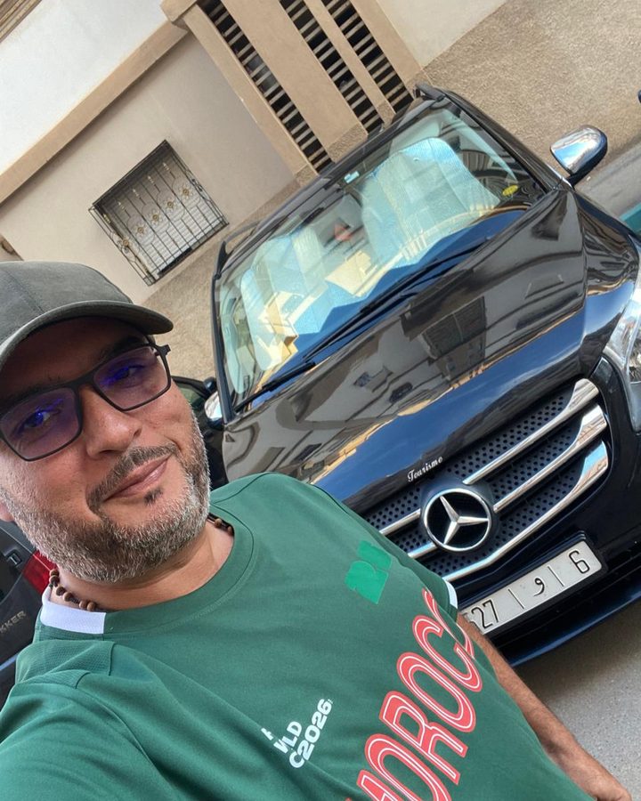 Baligh, your host, beside his Mercedes van