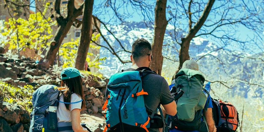 Hikers on a rocky trail above Imlil in the High Atlas