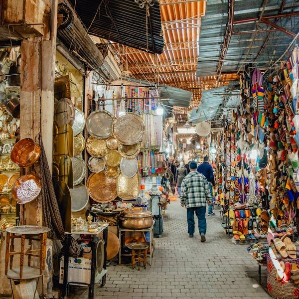 Lanterns, brass and slippers in a Marrakech souk