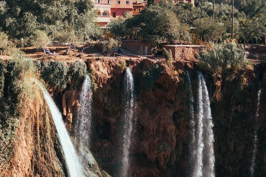 The Ouzoud waterfalls dropping into a green gorge